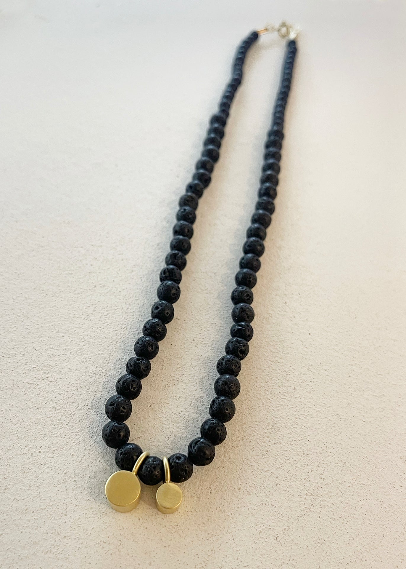 BLACK LAVE BEADS NECKLACE W/CYLINDER PENANTS