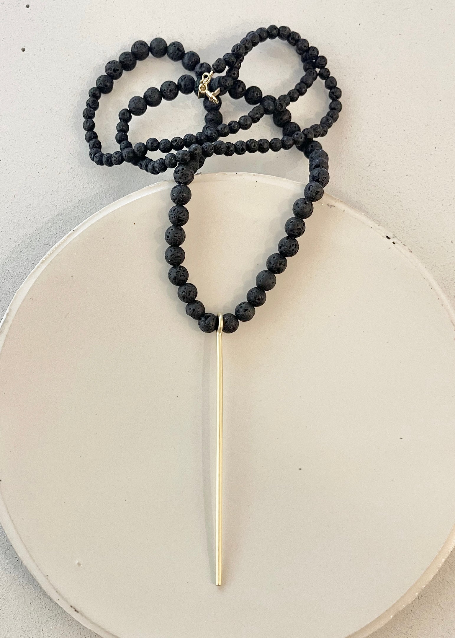 BLACK LAVE BEADS NECKLACE W/LINE PENDANT