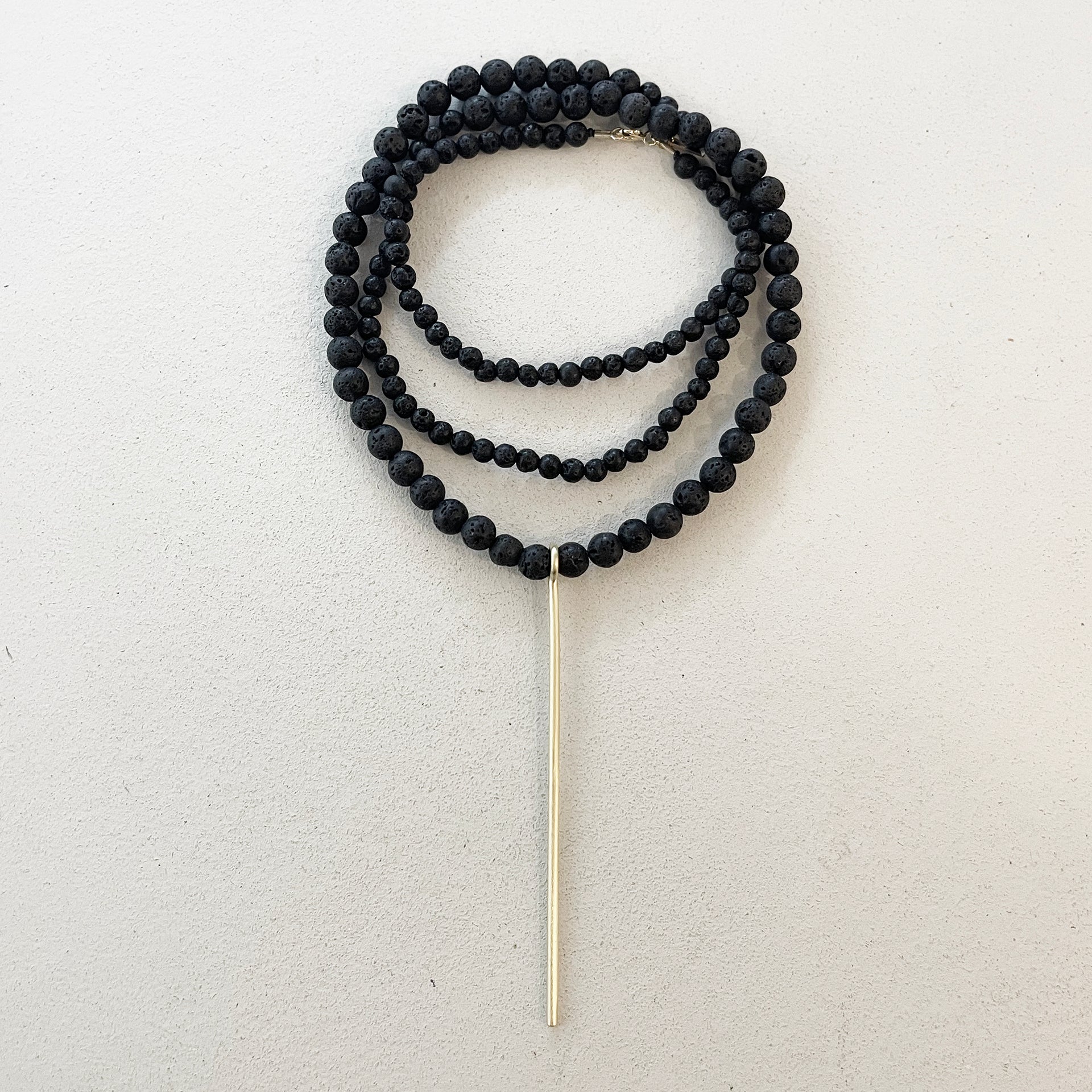 BLACK LAVE BEADS NECKLACE W/LINE PENDANT