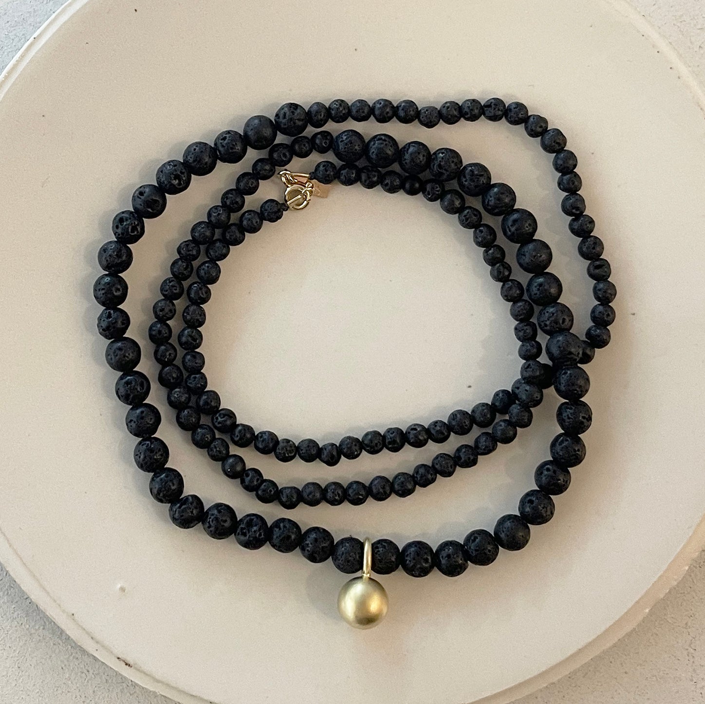 BLACK LAVE BEADS NECKLACE W/BALL PENDANT
