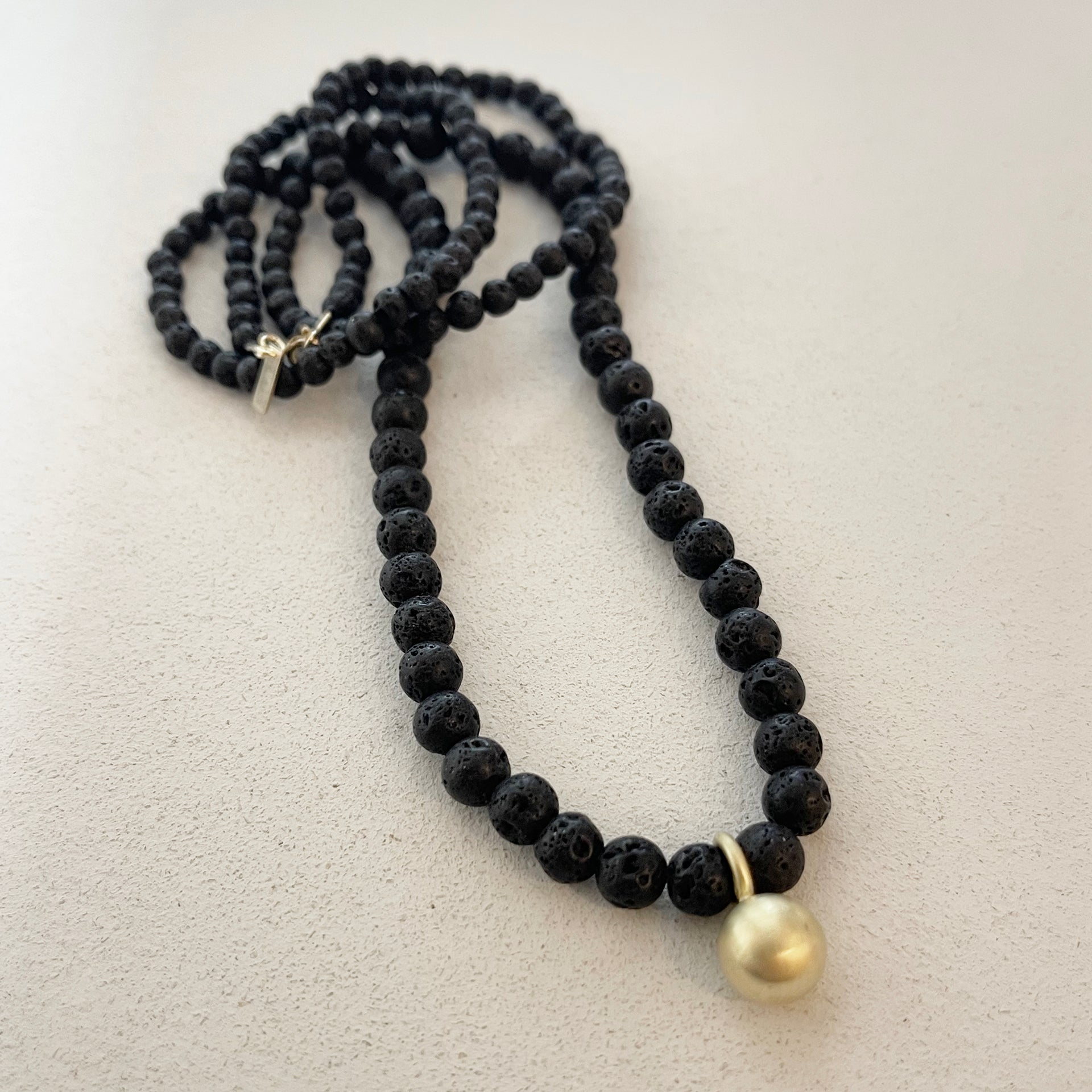 BLACK LAVE BEADS NECKLACE W/BALL PENDANT