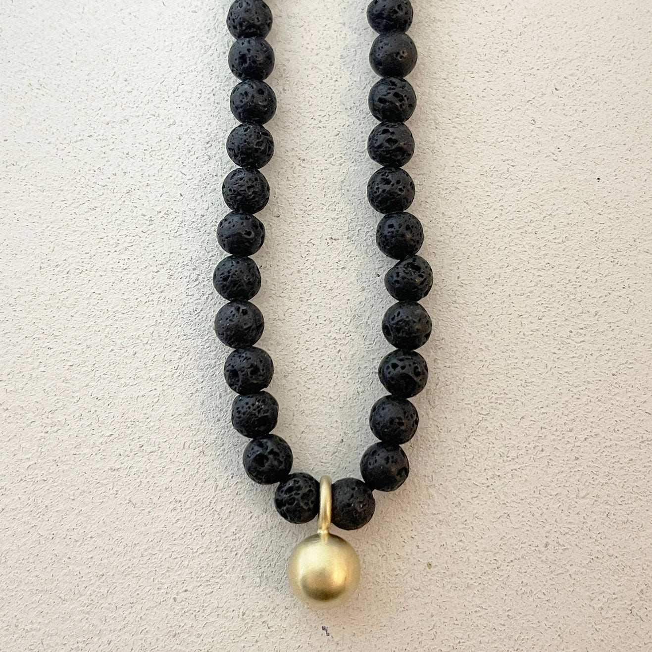 BLACK LAVE BEADS NECKLACE W/BALL PENDANT