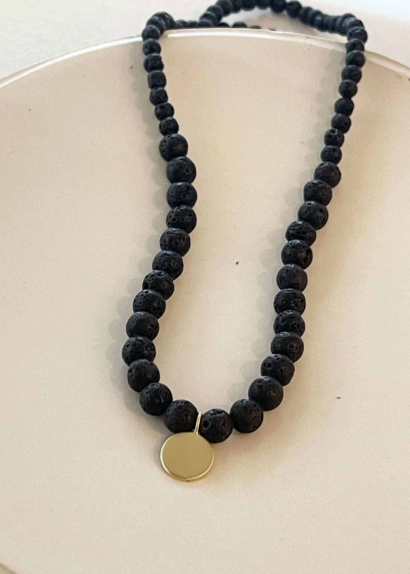 BLACK LAVE BEADS NECKLACE W/TAG PENANT