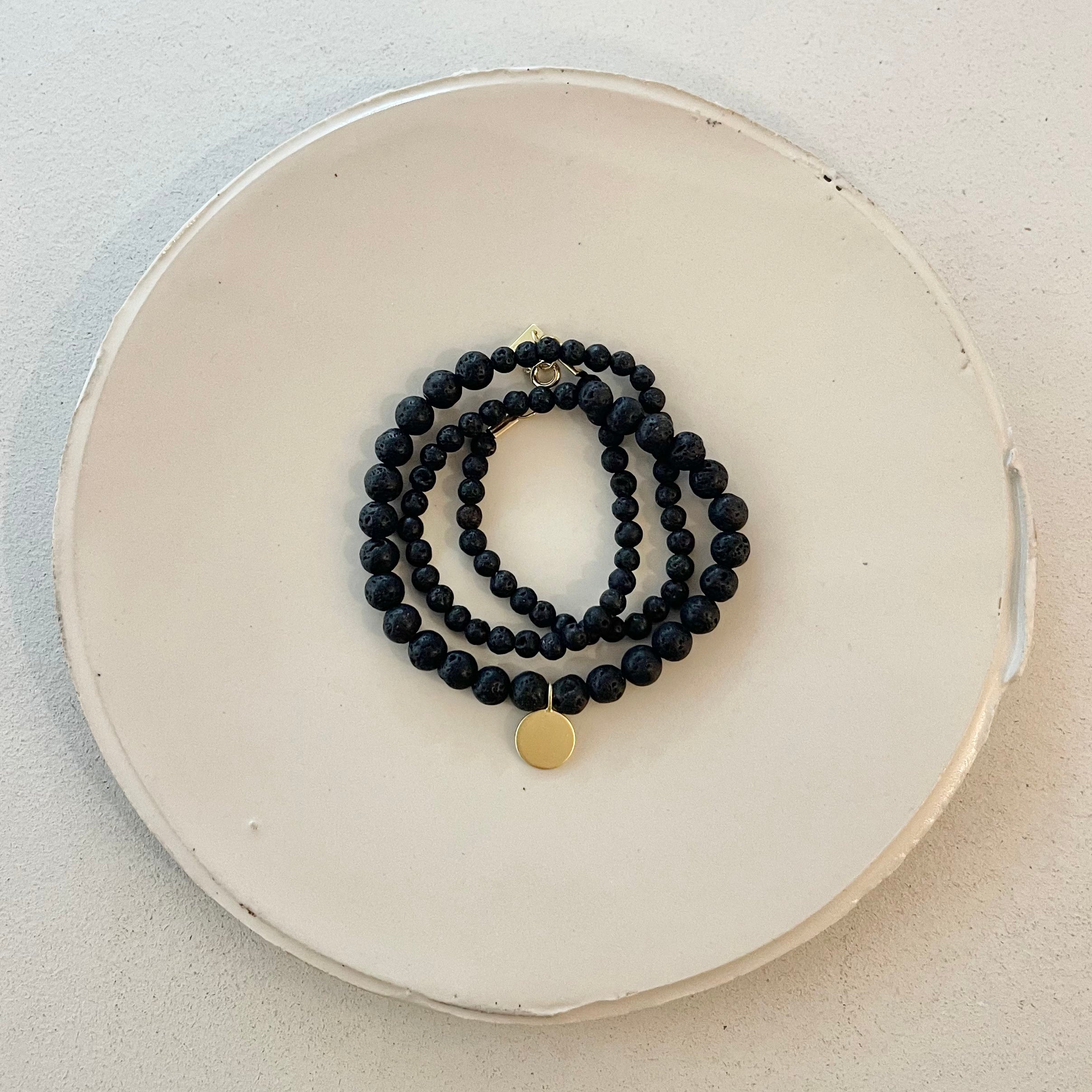 BLACK LAVE BEADS NECKLACE W/TAG PENANT