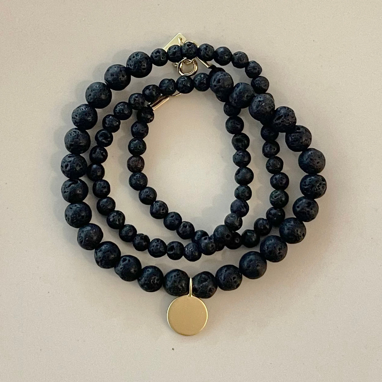 BLACK LAVE BEADS NECKLACE W/TAG PENANT