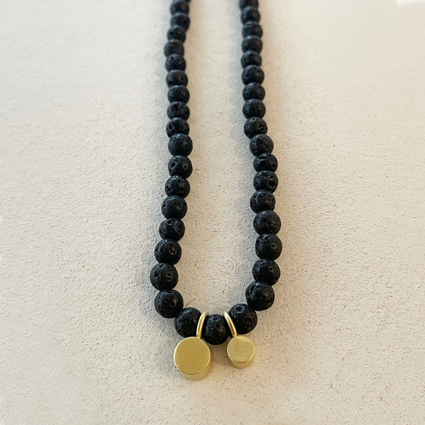 BLACK LAVE BEADS NECKLACE W/CYLINDER PENANTS