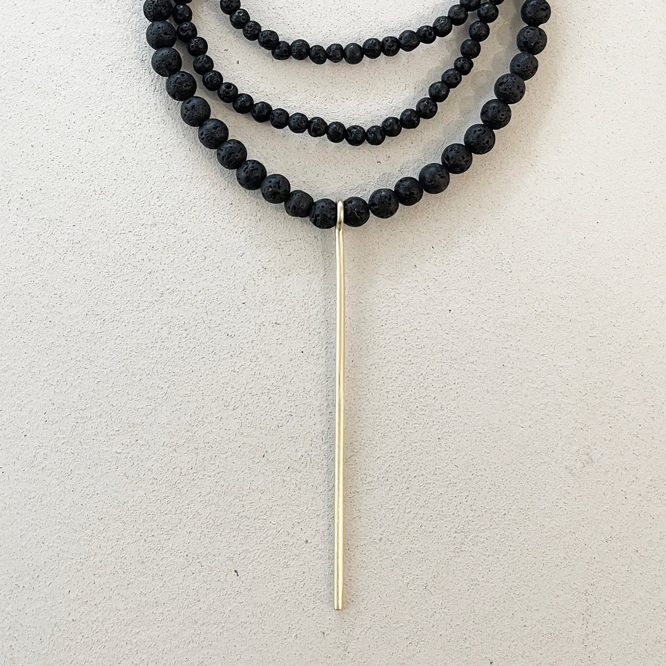 BLACK LAVE BEADS NECKLACE W/LINE PENDANT
