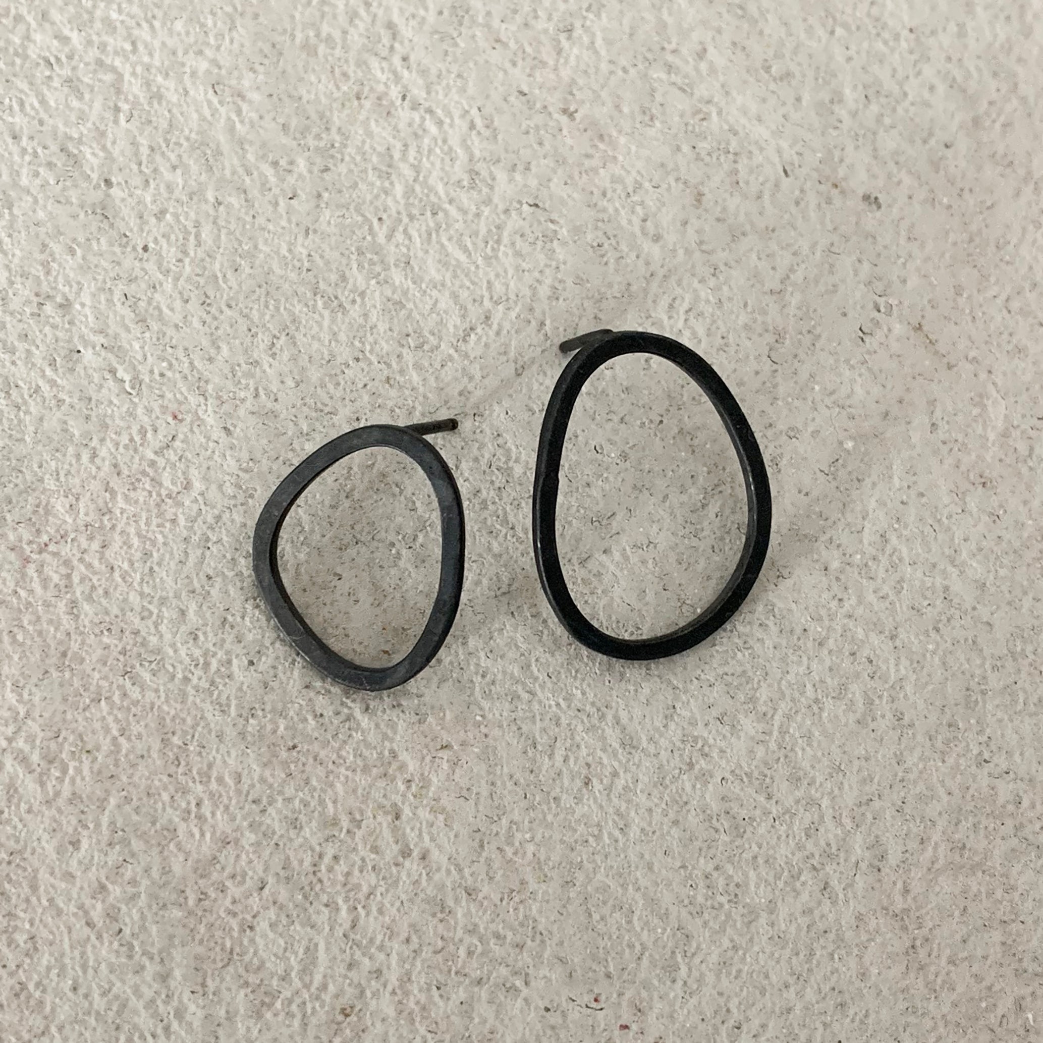 Asymmetrical rock shaped stud