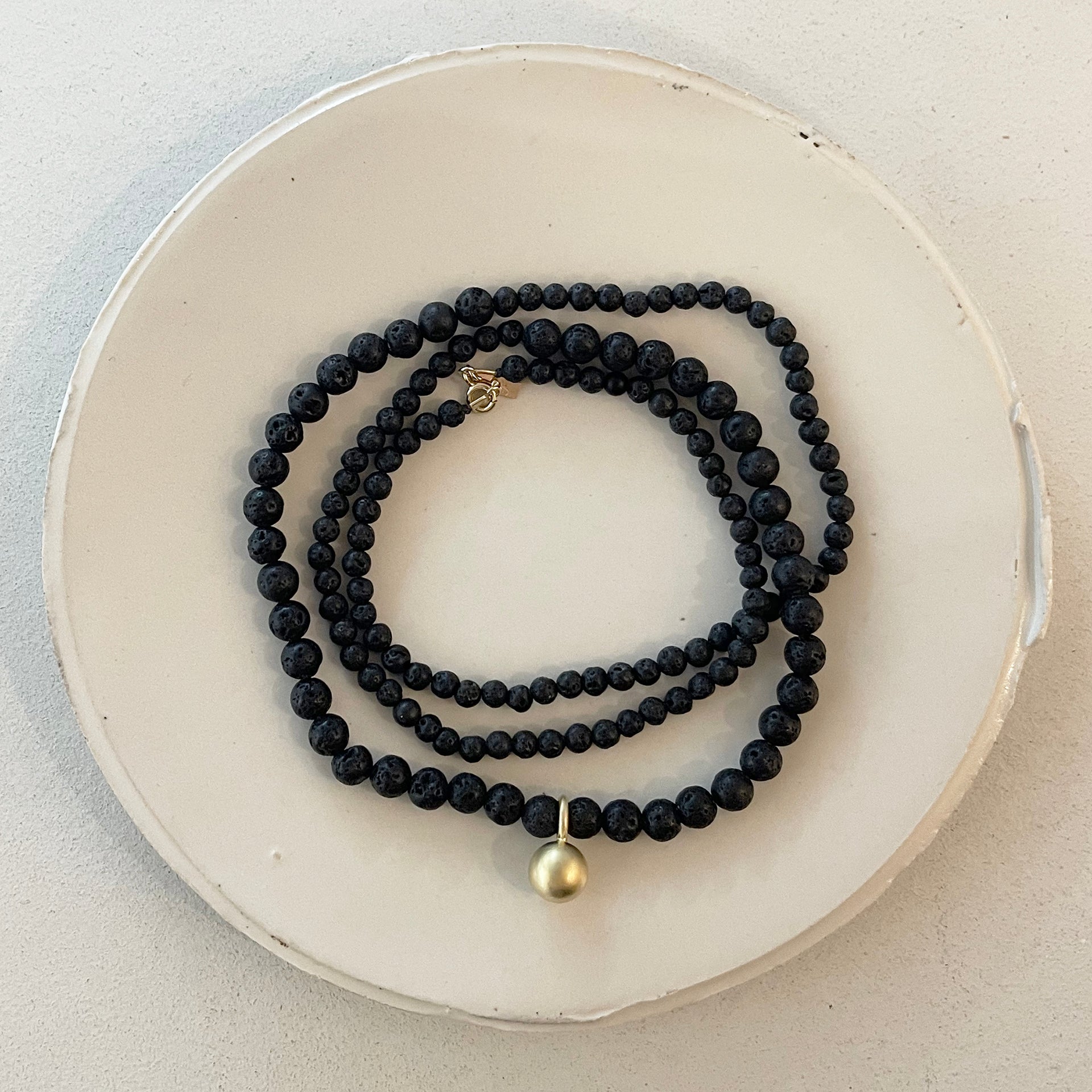 BLACK LAVE BEADS NECKLACE W/BALL PENDANT