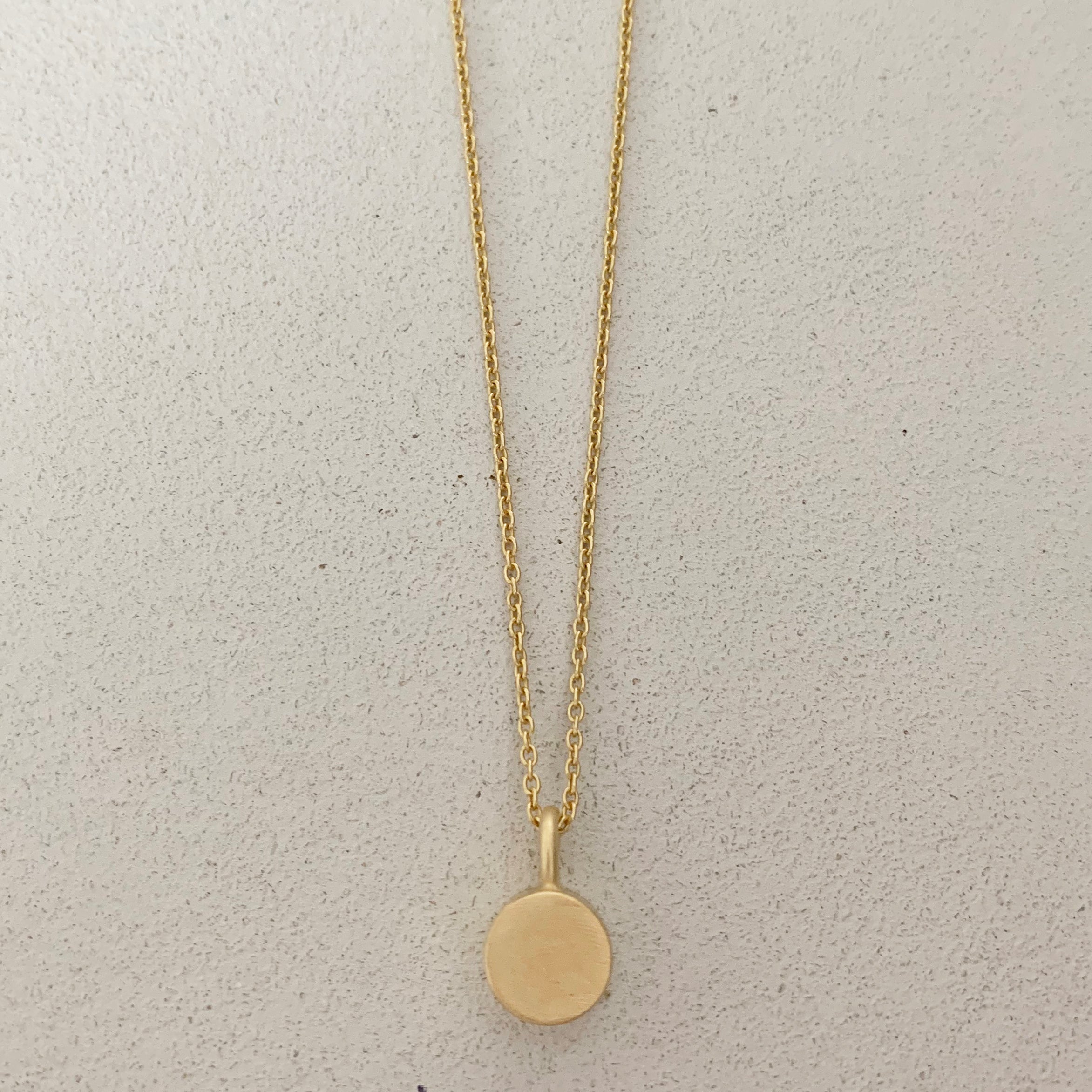 GOLD CYLINDER NECKLACE